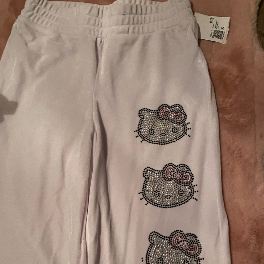 Hello kitty white velour pants. NWT size small. Forever21. Sold out.